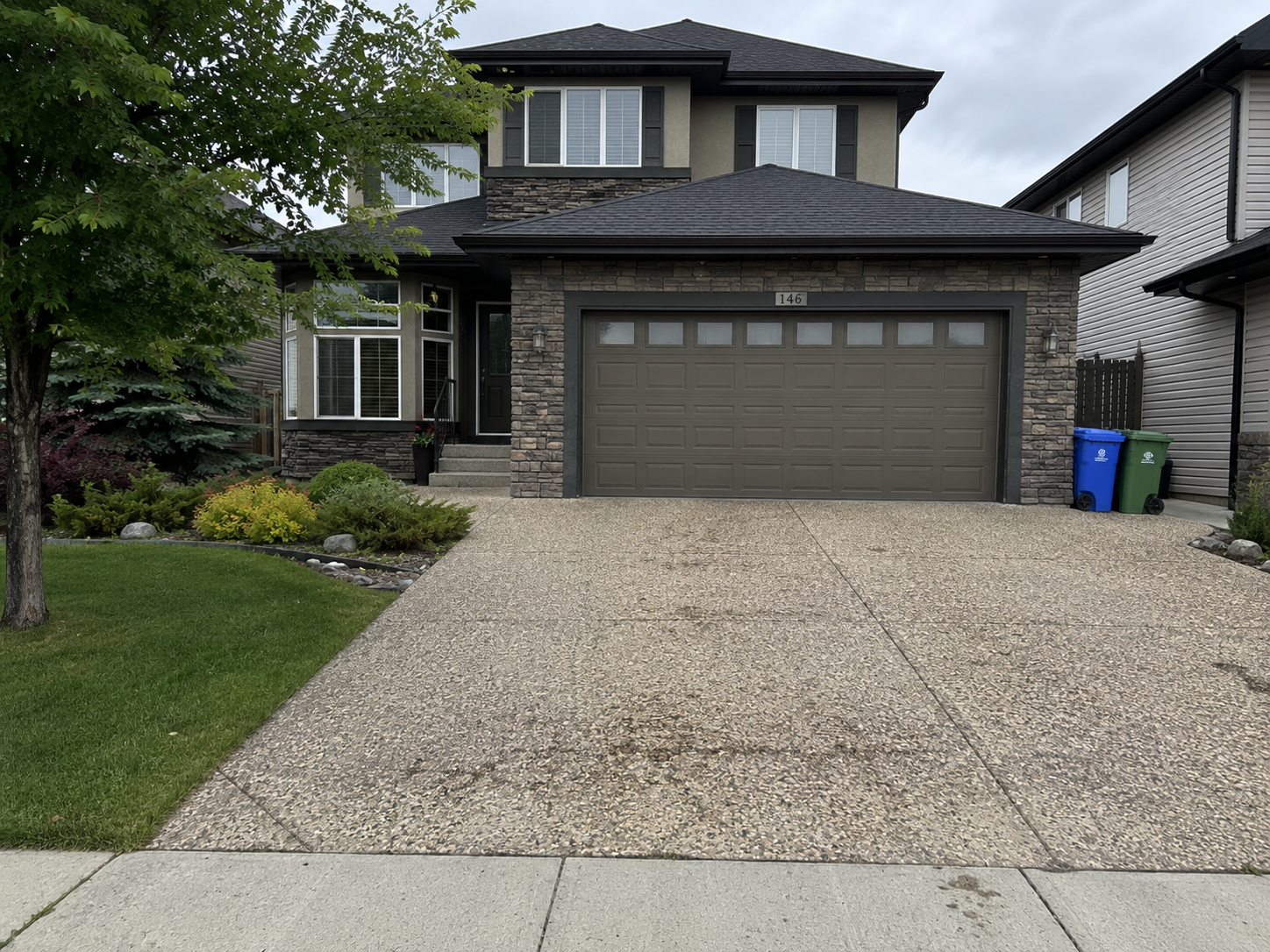 NW Calgary driveway before sealcoating